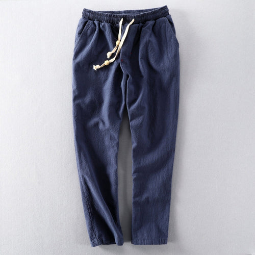 RELAXED LINEN BLEND TROUSERS